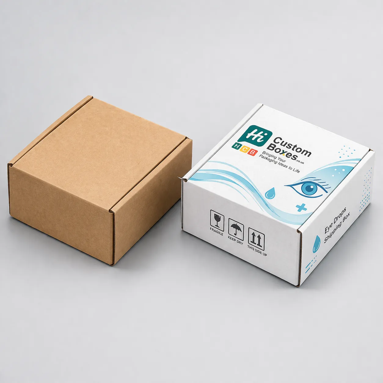 Two open corrugated mailer boxes, one natural brown Kraft and one with blue pharmaceutical branding prints. class=